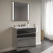 Curated Cartesian 24" x 7-1/2" x 21" and 24" x 15" x 21" three drawer vanity in tinted gray mirror glass with tip out drawer, slow-close plumbing drawer, full drawer and Engineered Stone 25" vanity top in Silestone lyra