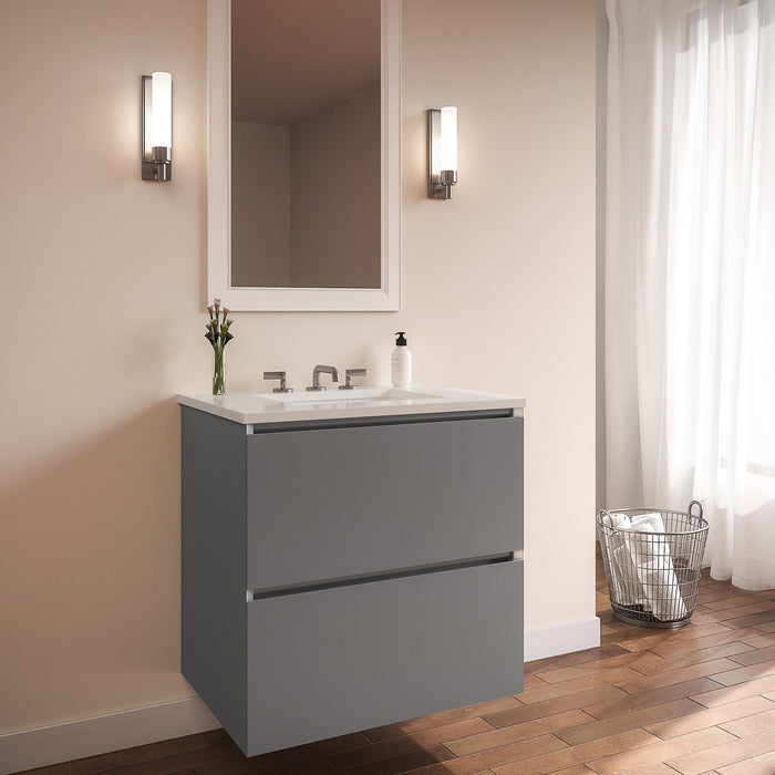 Curated Cartesian 24" x 15" x 21" two drawer vanity in matte gray glass with slow-close plumbing drawer, full drawer and Engineered Stone 25" vanity top in quartz white (Silestone white storm)