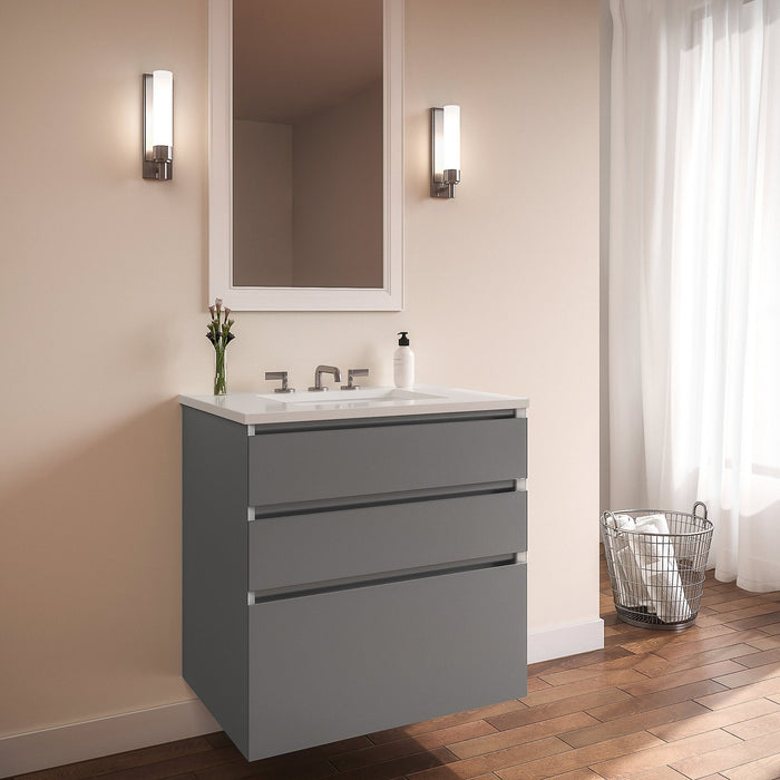Curated Cartesian 24" x 7-1/2" x 21" and 24" x 15" x 21" three drawer vanity in matte gray glass with tip out drawer, slow-close plumbing drawer, full drawer and Engineered Stone 25" vanity top in quartz white (Silestone white storm)
