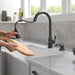 Delta Capertee 19877Z Single Handle Pull-Down Kitchen Faucet with Soap Dispenser and ShieldSpray Technology, matte black...