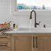 Delta Capertee 19877Z Single Handle Pull-Down Kitchen Faucet with Soap Dispenser and ShieldSpray Technology, venetian...