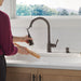 Delta Capertee 19877Z Single Handle Pull-Down Kitchen Faucet with Soap Dispenser and ShieldSpray Technology, venetian...