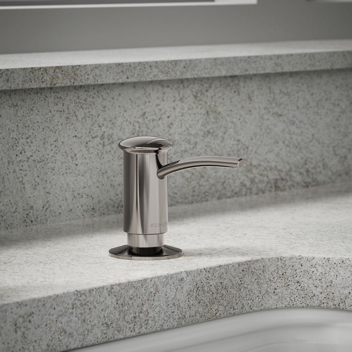 KOHLER K-1895-C Contemporary Design Soap/lotion Dispenser, Vibrant Titanium - Shows close up detail of product in room