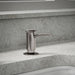 KOHLER K-1895-C Contemporary Design Soap/lotion Dispenser, Vibrant Titanium - Shows close up detail of product in room