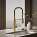 KOHLER K-24982 Purist Semi-professional kitchen sink faucet with three-function sprayhead, vibrant brushed moderne brass...