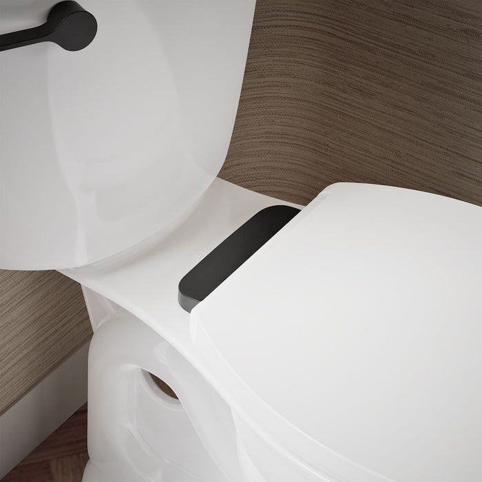 KOHLER K-27331-BL Glissade ReadyLatch® Quiet-Close™ Elongated Toilet Seat, White - Shows close up detail of product in room