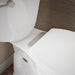 KOHLER K-27331-BN Glissade ReadyLatch® Quiet-Close™ Elongated Toilet Seat, White - Shows close up detail of product in room