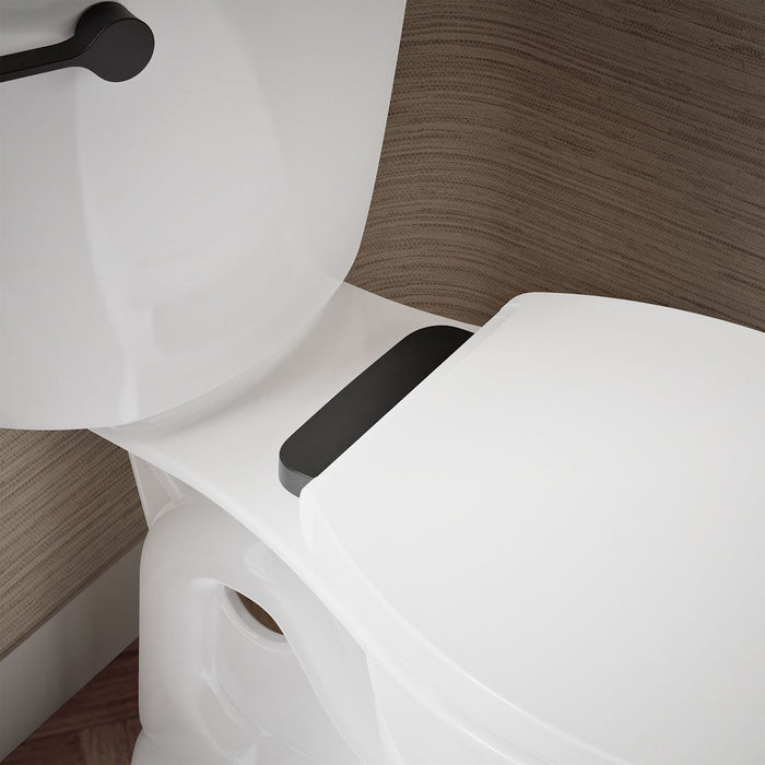 KOHLER K-27332-BL Glissade ReadyLatch® Quiet-Close™ Round-front Toilet Seat, White - Shows close up detail of product in room