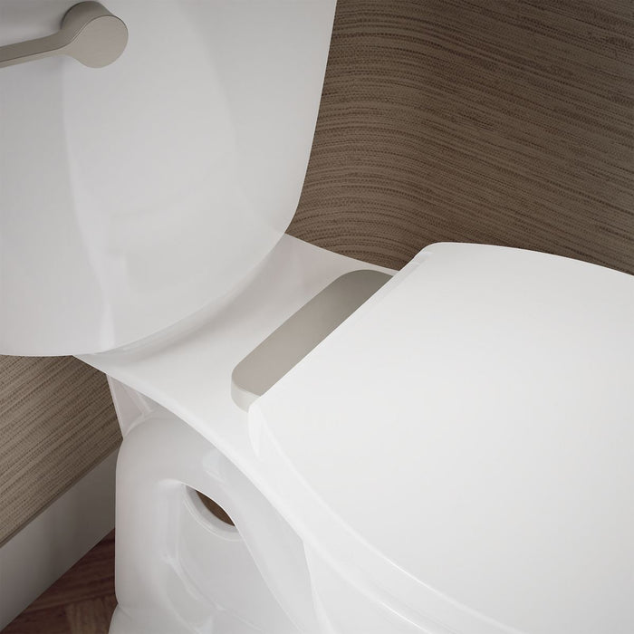 KOHLER K-27332-BN Glissade ReadyLatch® Quiet-Close™ Round-front Toilet Seat, White - Shows close up detail of product in room