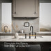KOHLER K-28673-3 Billet Two-hole bridge kitchen sink faucet with side sprayer, matte black with brushed moderne brass -...