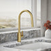 KOHLER K-34906 Elate Pull-down Kitchen Sink Faucet with Two-function Sprayhead, Vibrant Brushed Moderne Brass - Shows close u
