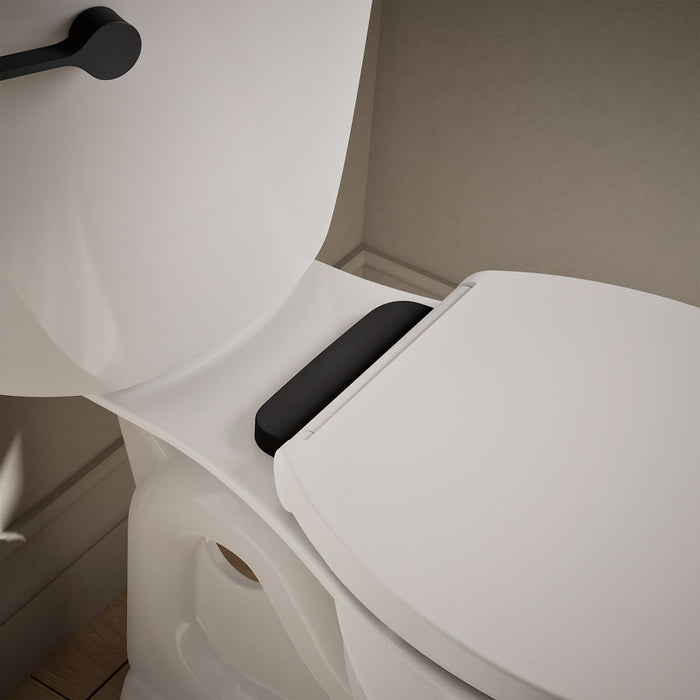 KOHLER K-36594-BL Covert ReadyLatch® Quiet-Close™ Round-front Toilet Seat, White - Shows close up detail of product in room