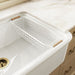 KOHLER K-36794 Wire Sink Basket for Audrine Farmhouse Kitchen Sink, Cloude White - Shows close up detail of product in room