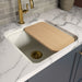 KOHLER K-37818 White Oak Cutting Board for Audrine Kitchen Sink - Shows close up detail of product in room