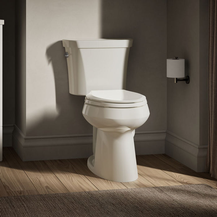 KOHLER K-3989 Highline Two-piece Elongated Toilet, Dual-flush, Biscuit - image focused on single product story