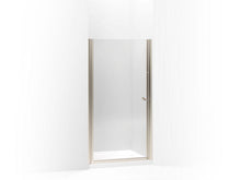 Load image into Gallery viewer, KOHLER 702408-L-ABV Fluence Pivot Shower Door, 65-1/2&quot; H X 33-3/4 - 35-1/4&quot; W, With 1/4&quot; Thick Crystal Clear Glass in Anodized Brushed Bronze
